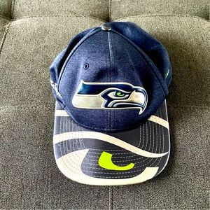 Unisex Seattle Seahawks hat. One size, adjustable. Metallic seahawk logo